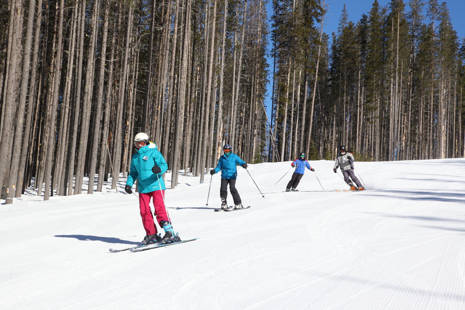 Senior group skiing down the hill at Lookout